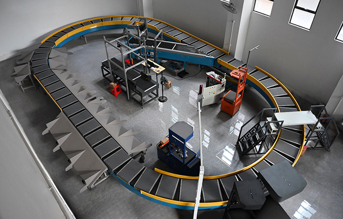 環(huán)型交叉帶分揀機(jī)的工作原理、特點(diǎn)及應(yīng)用